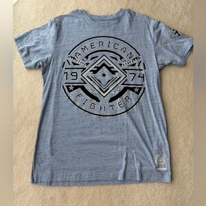 American Fighter for Buckle Light Heather Blue Emblem Tee Logo T-Shirt